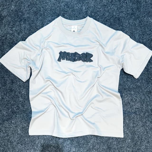 Off-White with a dark blue or gray accent T-Shirt