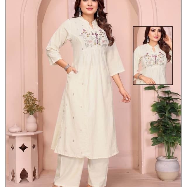 Off-white with hints of purple, green, and yellow in the embroidery. Kurta with Palazzo Pants