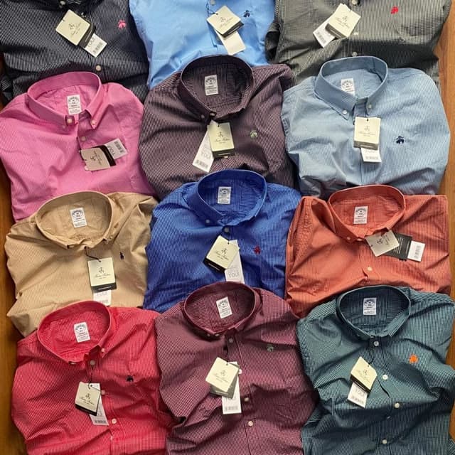 Various, including pink, blue, red, brown, tan, and green, all with subtle check patterns. Button-down shirts