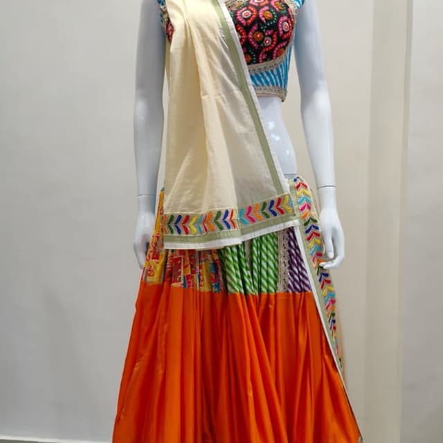 Multicolor, with prominent shades of orange, green, blue, and cream Lehenga Choli with Dupatta