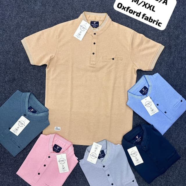 Various solid colors including beige, blue, pink, gray, and navy. Henley Shirt