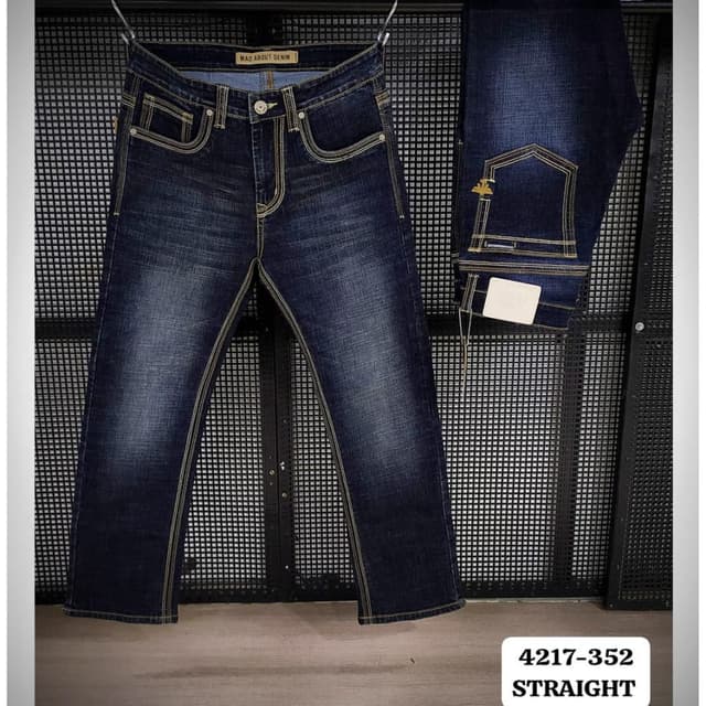 Dark Blue, with contrast stitching in a lighter tan or gold color. Jeans