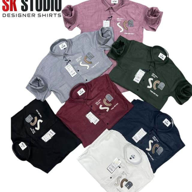 Various solid colors including black, white, navy, burgundy, grey, green, and a mauve-pink. Shirt
