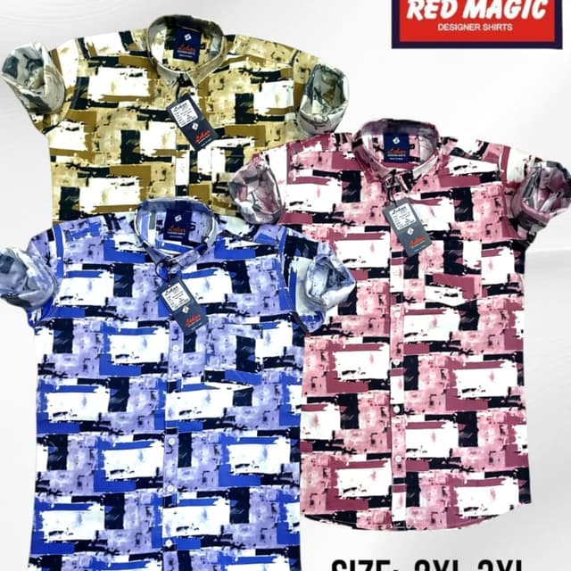 Various abstract patterns in shades of blue, pink, and brown with black and white accents. Shirt
