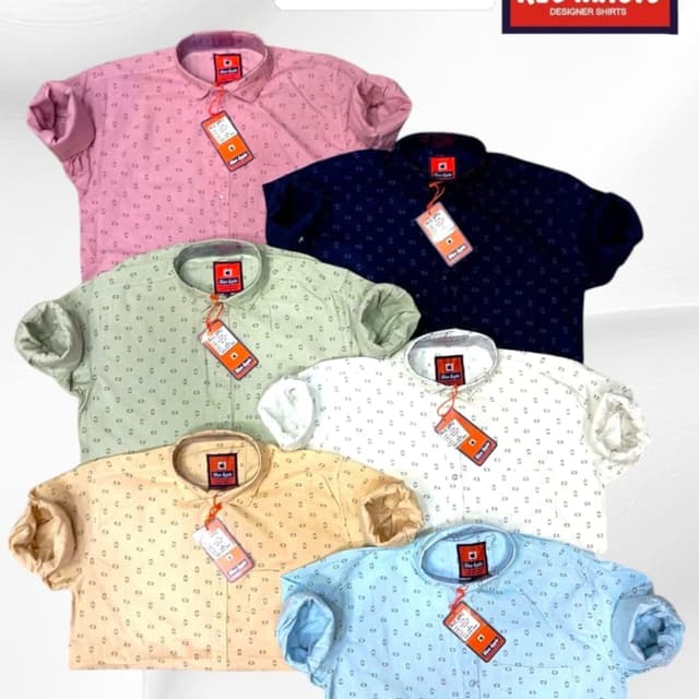 Various pastel and neutral colors including pink, navy blue, light green, white, beige, and light blue. Each shirt features a similar pattern but in different hues. Shirt