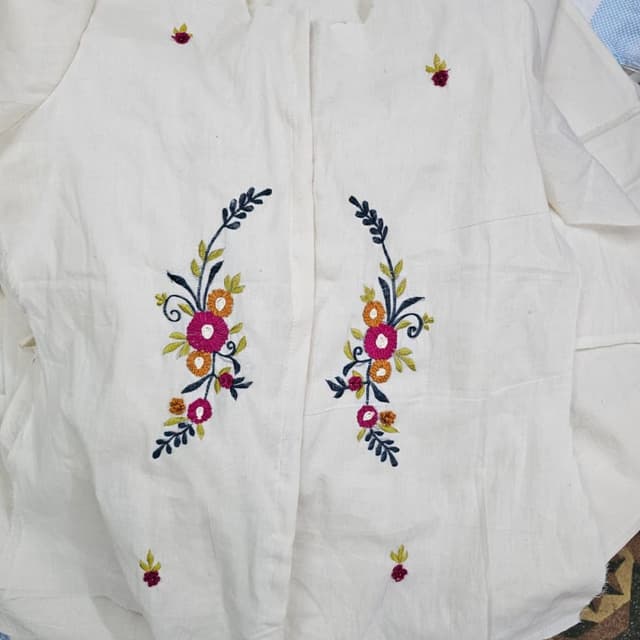 White with a mix of colors like pink, orange, yellow, green, and navy blue Shirt