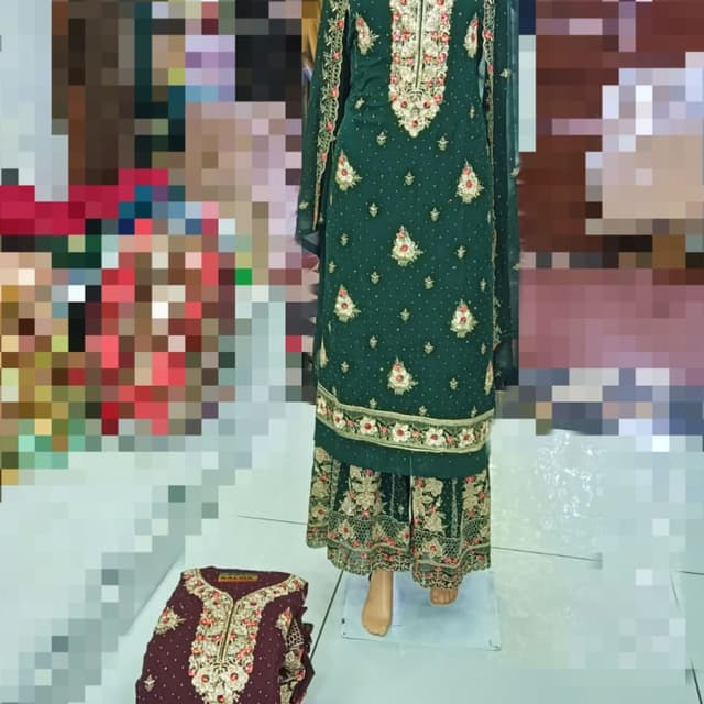 Emerald green with gold, red, and cream accents Sharara suit