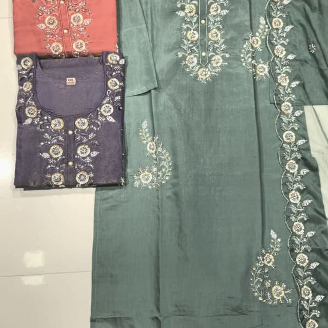 Various shades including dusty rose, dusty blue, and a muted green Kurta Suit