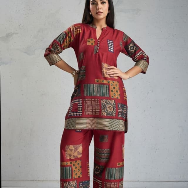 Red, with patches of various colors including brown, yellow, green, and blue. Kurta and Palazzo set