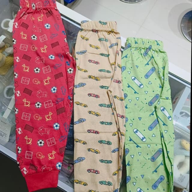 Red, Beige, and Green with multi-colored print Pajama pants