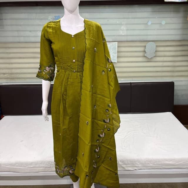 Olive Green with subtle hints of pink and white in the embroidery Salwar Kameez with Dupatta