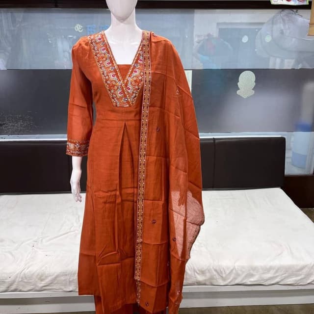 Burnt Orange with multi-colored embroidery accents Salwar Kameez with Dupatta