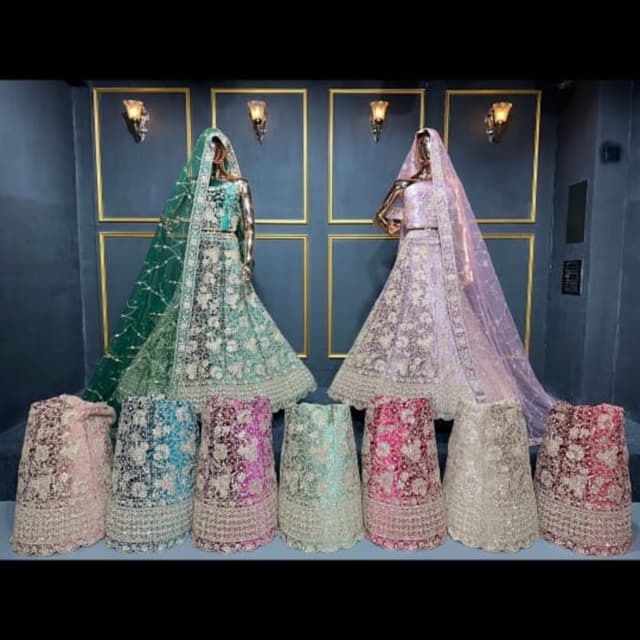 Various pastel colors including teal, pink, purple, and off-white with metallic accents Lehenga Choli