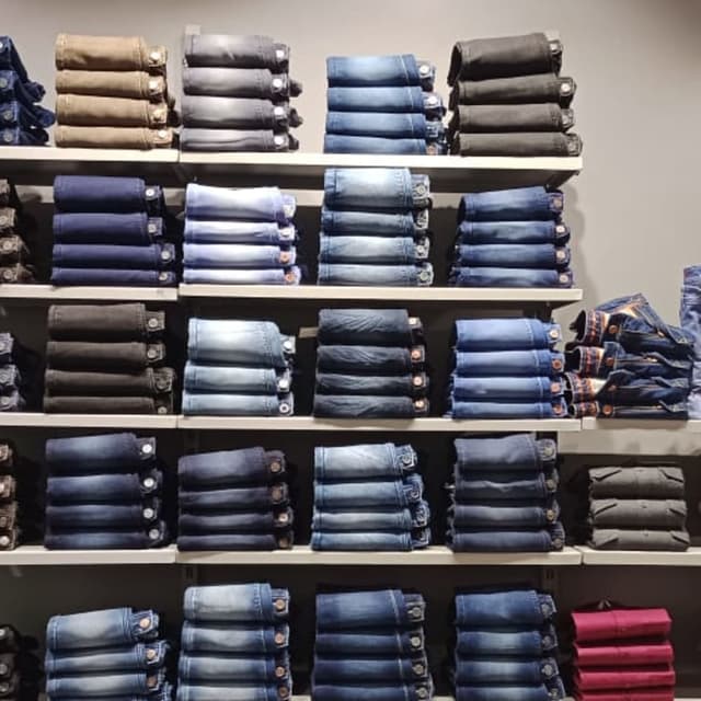 Various shades of blue, gray, brown, and pink Jeans