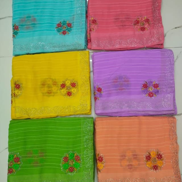Various pastel colors including turquoise, pink, yellow, purple, green, and peach Saree