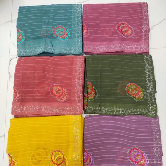 Various, including teal, maroon, salmon, olive green, yellow, and purple. Saree