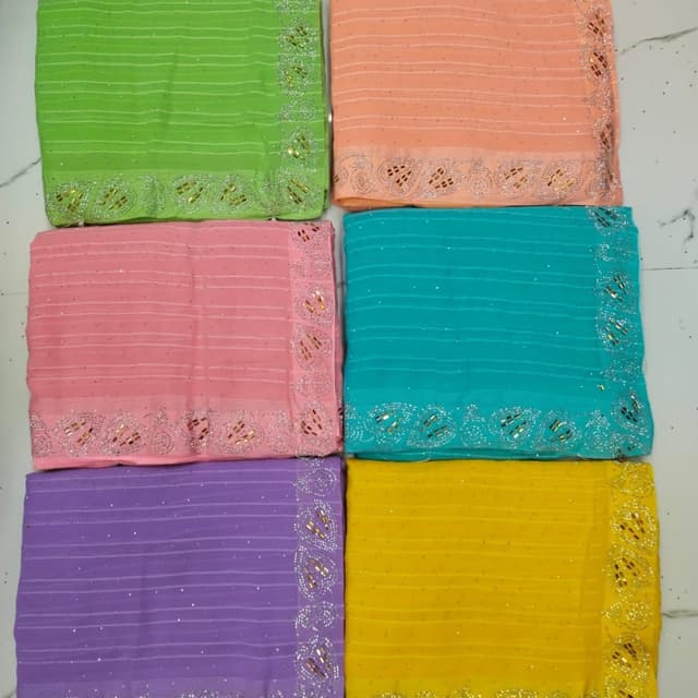 Variety of pastel colors, including green, peach, pink, turquoise, purple, and yellow Saree