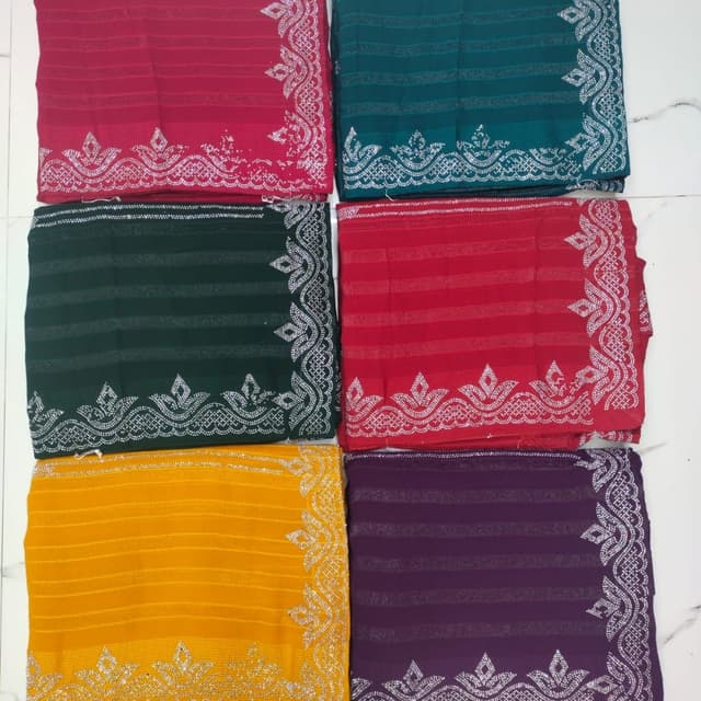 Various - Including Red, Green, Yellow, Purple, and Teal with Silver embellishments Saree