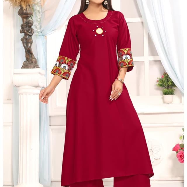 Red, with multicolored embroidery accents Kurta with matching trousers