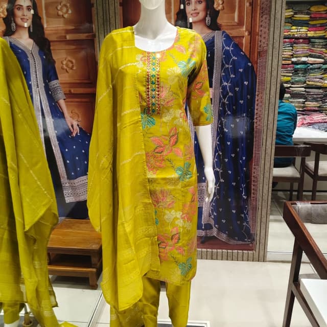 Yellow with multi-colored floral prints Salwar Kameez