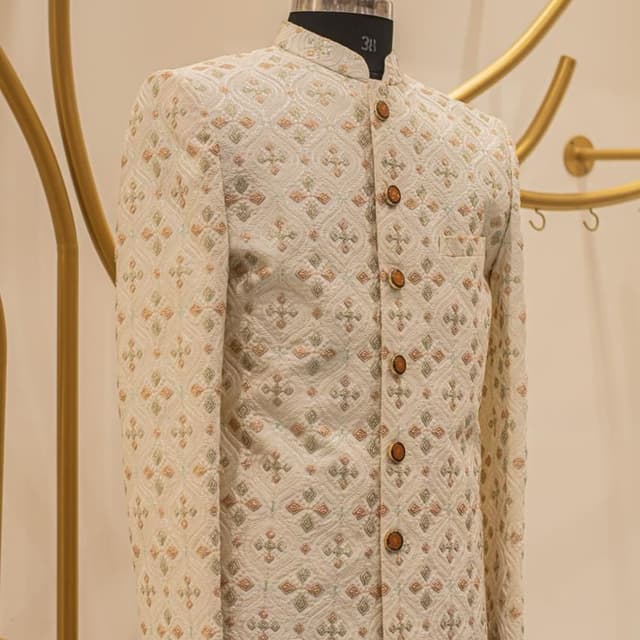 Ivory, with accents of gold, green and peach Jacket