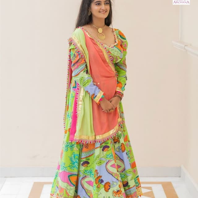 Vibrant green, pink, orange, blue, and gold Lehenga Choli with Dupatta