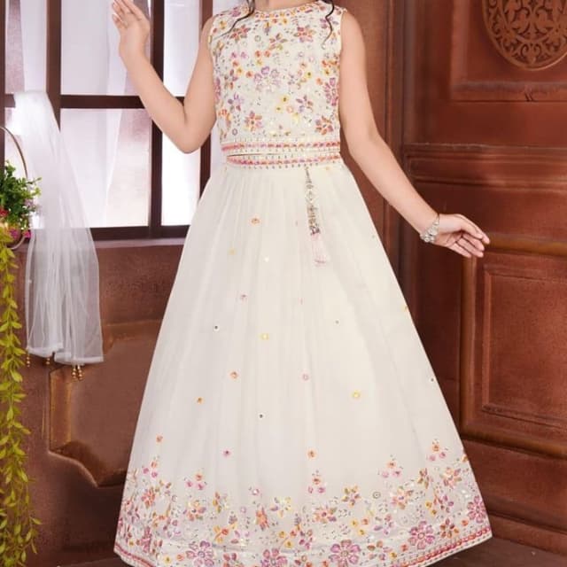 Ivory, with floral accents in pink, orange, yellow, and green. Dress