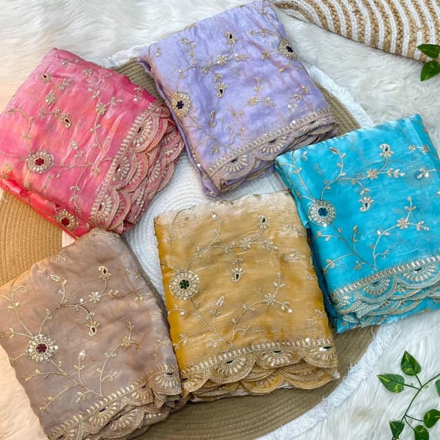 Various pastel shades, including pink, purple, blue, yellow, and beige. Saree