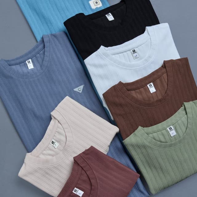 Various solid colors including black, white, brown, green, blue, and beige. T-shirt