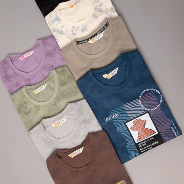 Various shades including purple, green, gray, brown, and blue with a tie-dye effect. T-shirts