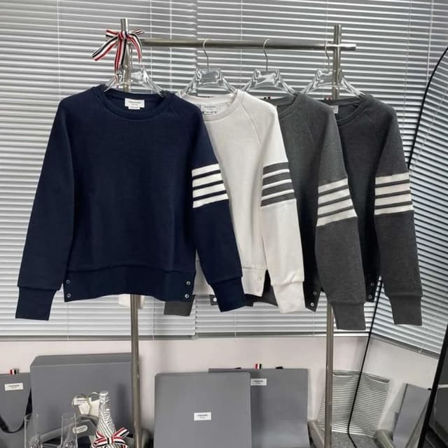 Navy blue, white, gray, and variations thereof. Sweatshirt