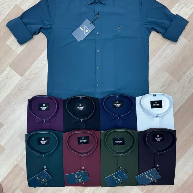 Variety of solid colors including teal, purple, black, navy, white, dark green, maroon, olive green, and dark brown. Shirt