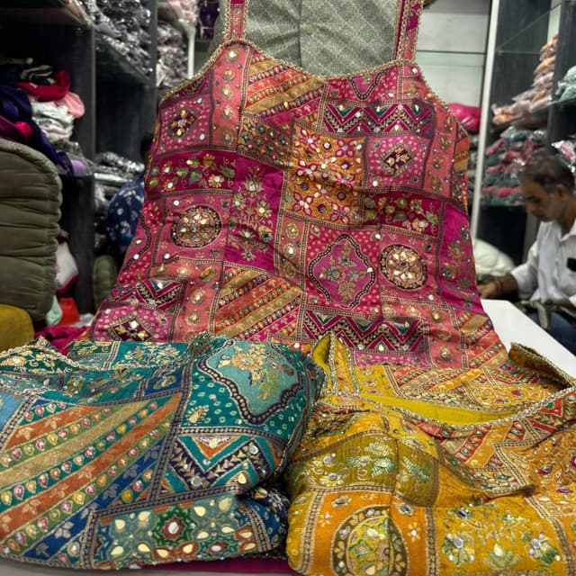 Pink, Gold, Teal, Yellow, and various other colors in a patchwork design Blouse or Top