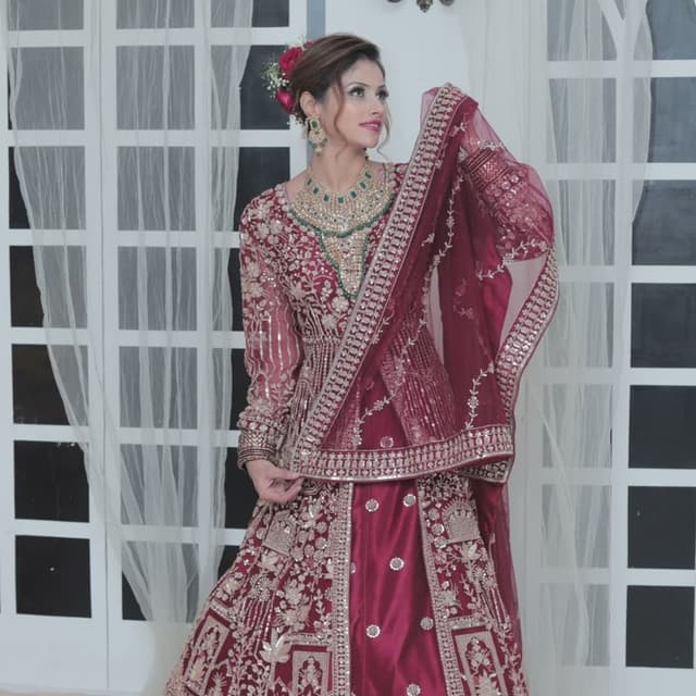 Maroon, Gold, and touches of Green Lehenga Choli