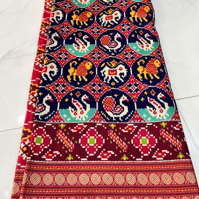 Red, maroon, dark blue, yellow, turquoise, and white Saree
