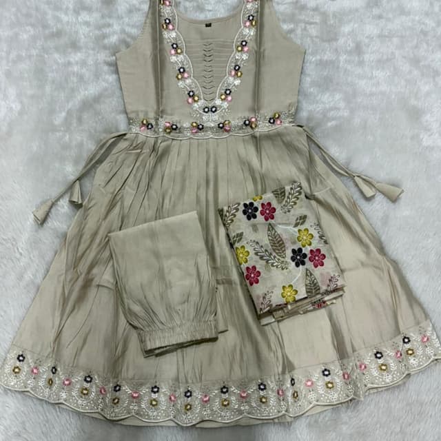 Beige, with floral accents in pink, yellow, black and white Anarkali Suit