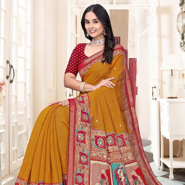 Mustard yellow, red, and off-white Saree