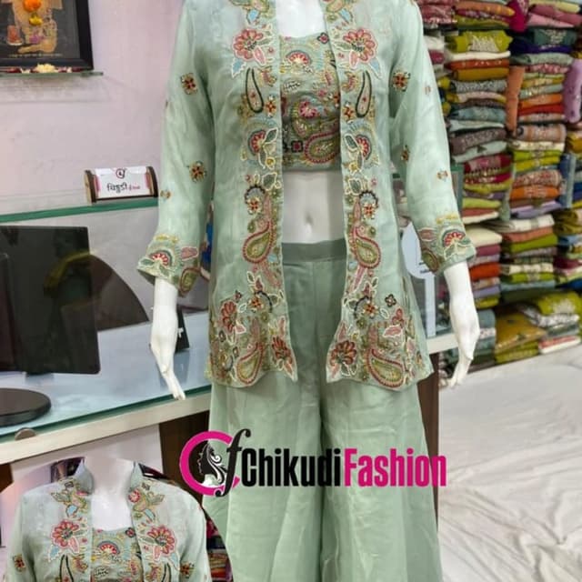 Seafoam green with accents of red, blue, and gold embroidery Sharara Set