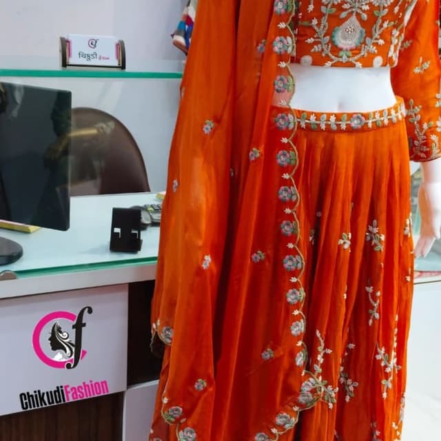 Orange with Green, Blue and White accents Lehenga Choli