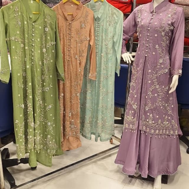 Various pastel shades including sage green, peach, seafoam green, and lavender Anarkali Suit or similar style suit