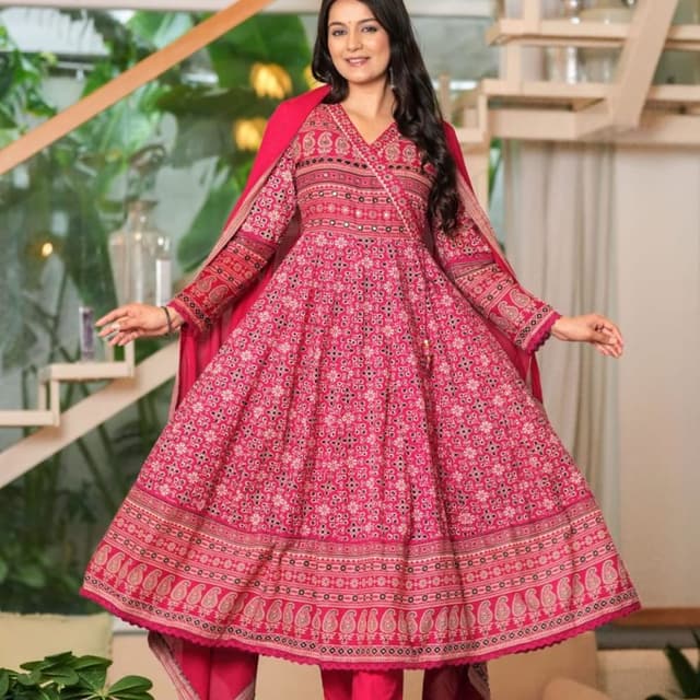 Magenta, with accents of gold, black and white. Anarkali Suit Set