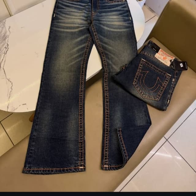 Dark Blue, Faded Blue, and Orange Jeans