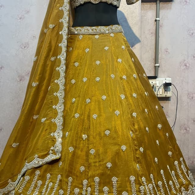 Mustard yellow with silver and black accents Lehenga Choli