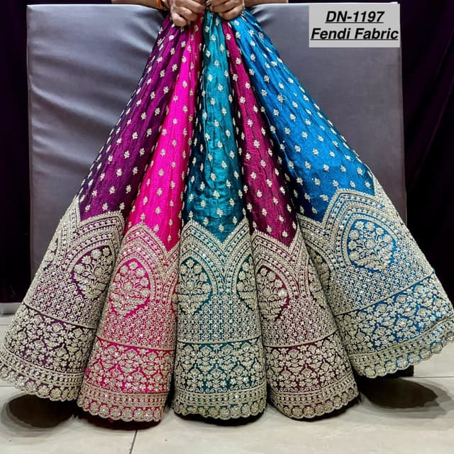 Purple, pink, teal, and blue with gold embellishments Lehenga