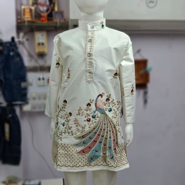 Ivory white with multi-colored embroidery (pink, blue, green, brown, gold) Kurta Pyjama Set