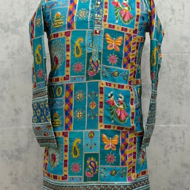 Teal, with accents of yellow, red, pink, purple, and gold Kurta