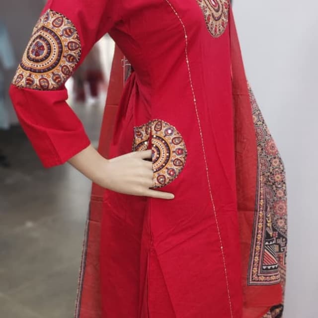 Red, with accents of gold, brown, blue and white Kurta with Dupatta