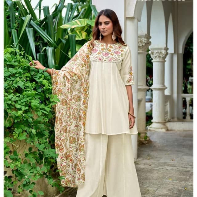 Ivory, with accents of pink, green, and yellow in the embroidery and dupatta. Kurta and Palazzo Set with Dupatta