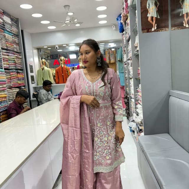 Mauve with a touch of pastel green and yellow embroidery Salwar Kameez