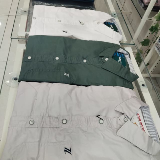 White, Olive Green, Light Gray Shirt